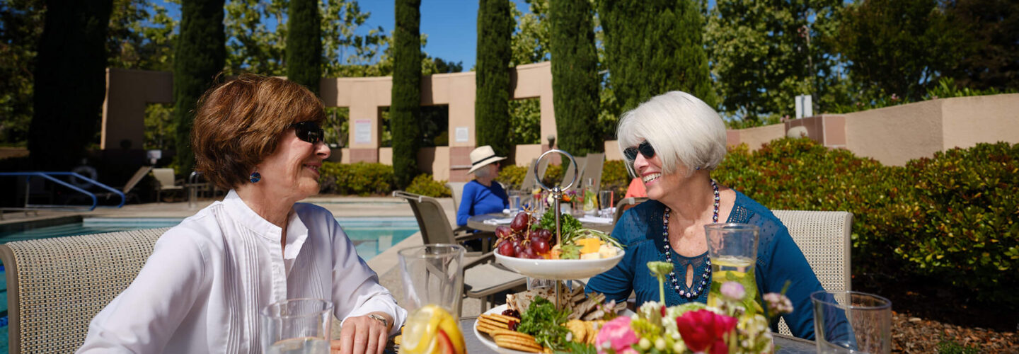 Women enjoying a snack outside