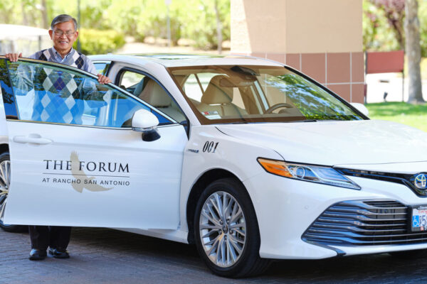 Driver opening door of car