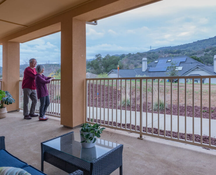 couple on patio enjoying view