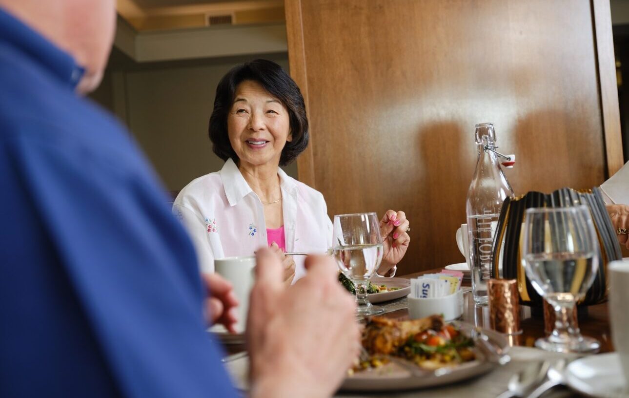 couple enjoying a meal in the dining room
